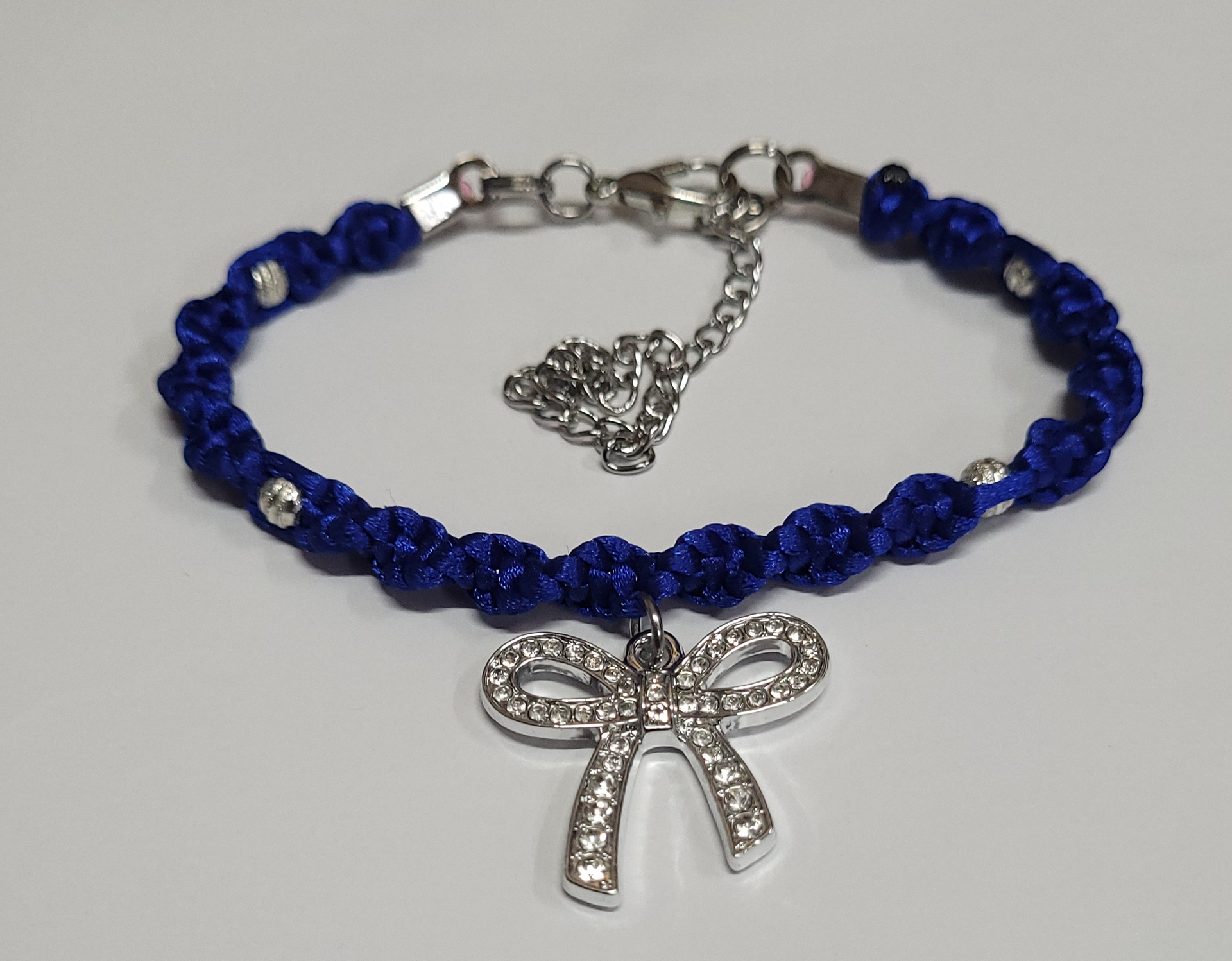 Royal Blue Twisted Macrame Bracelet/Anklet featuring a Silver Bow, fits from 6.5 to 10 inches, durable 316 stainless steel accents.