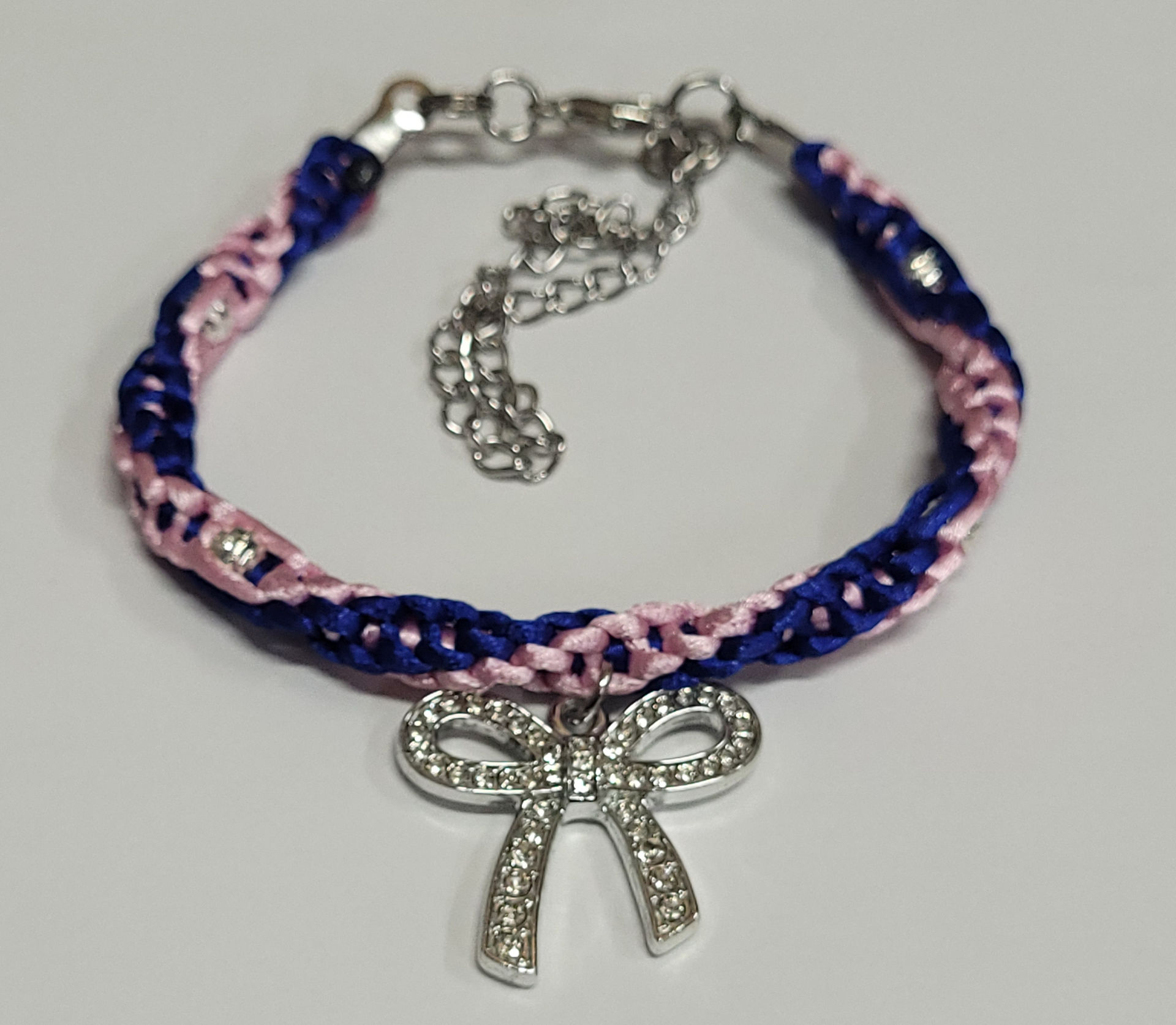 Royal Blue & Pink Twisted Macrame Bracelet/Anklet featuring a Silver Bow, fits from 6.5 to 10 inches, durable 316 stainless steel accents.