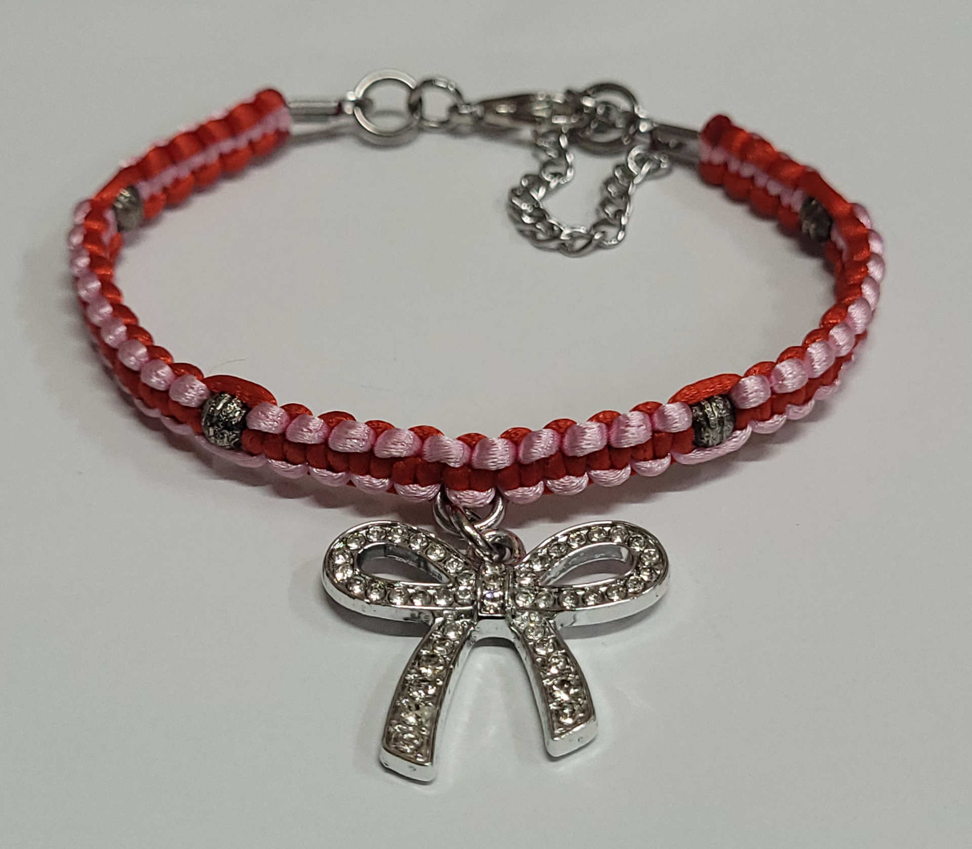 Red & Pink Macrame Bracelet/Anklet featuring a Silver Bow, fits from 6.5 to 10 inches, durable 316 stainless steel accents.