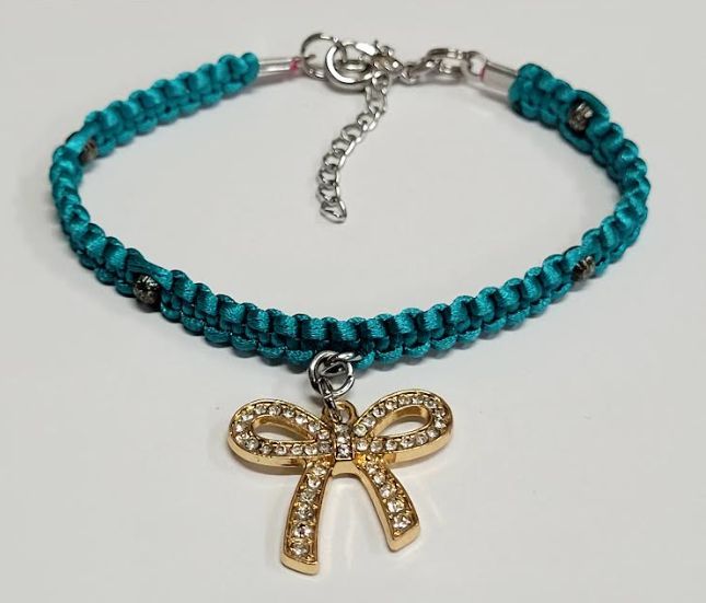 Teal Macrame Bracelet/Anklet featuring a Gold Bow, fits from 6.5 to 10 inches, durable 316 stainless steel accents.