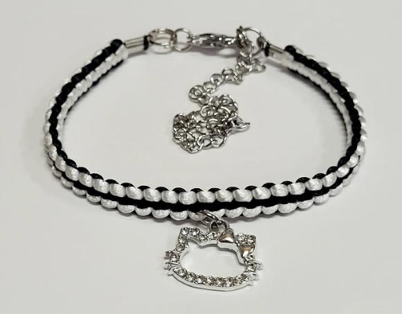 White & Black Macrame Bracelet/Anklet with Cat Charm fits from 6.5 to 10 inches, durable 316 stainless steel accents.