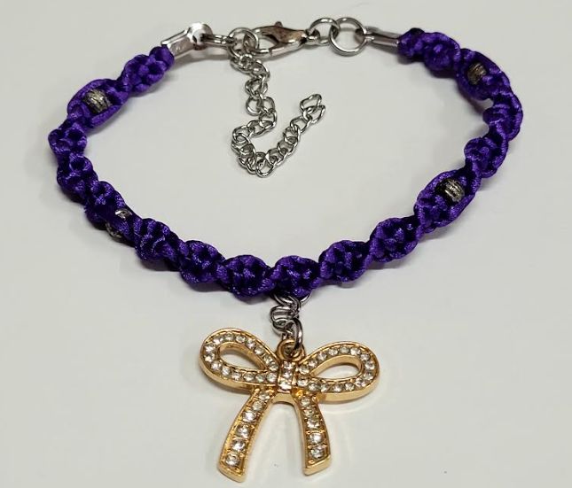 Purple Twisted Macrame Bracelet/Anklet featuring a Gold Bow, fits from 6.5 to 10 inches, durable 316 stainless steel accents.