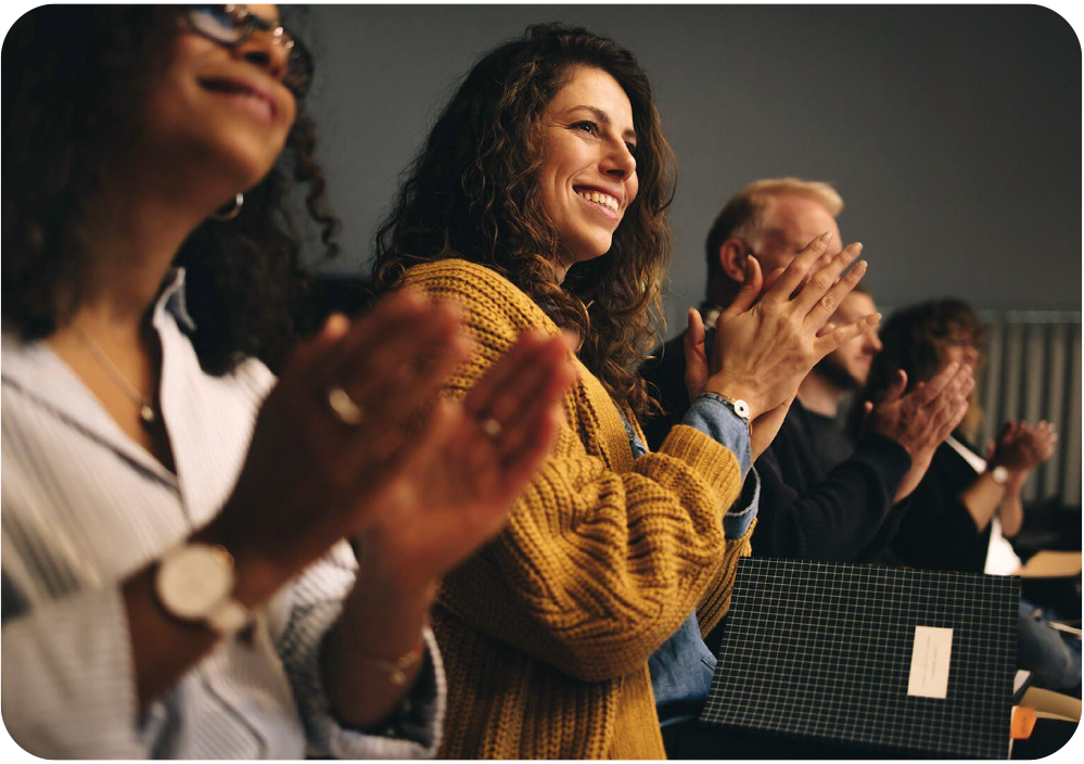 Members at event applauding
