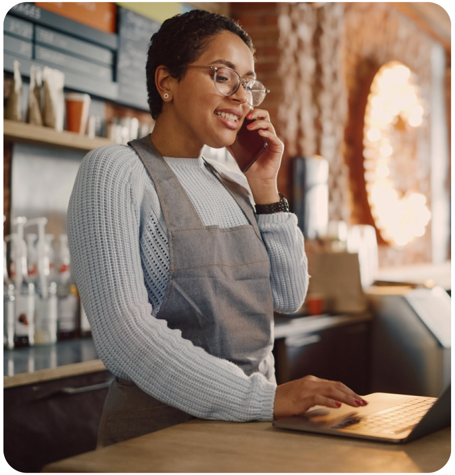 Business owner accepting payment over the phone