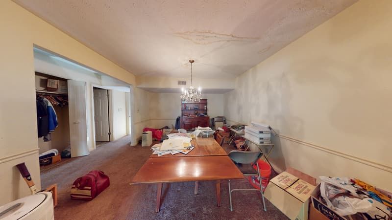 Water-damaged dining room before restoration