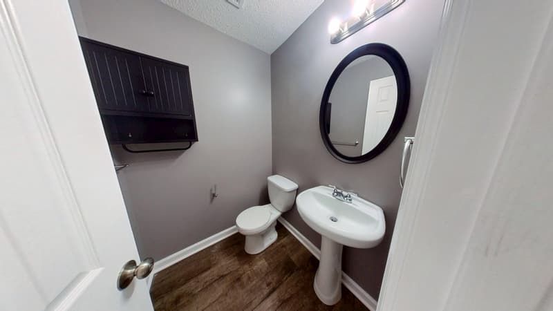 Bathroom after fire damage restoration showing clean updated finish