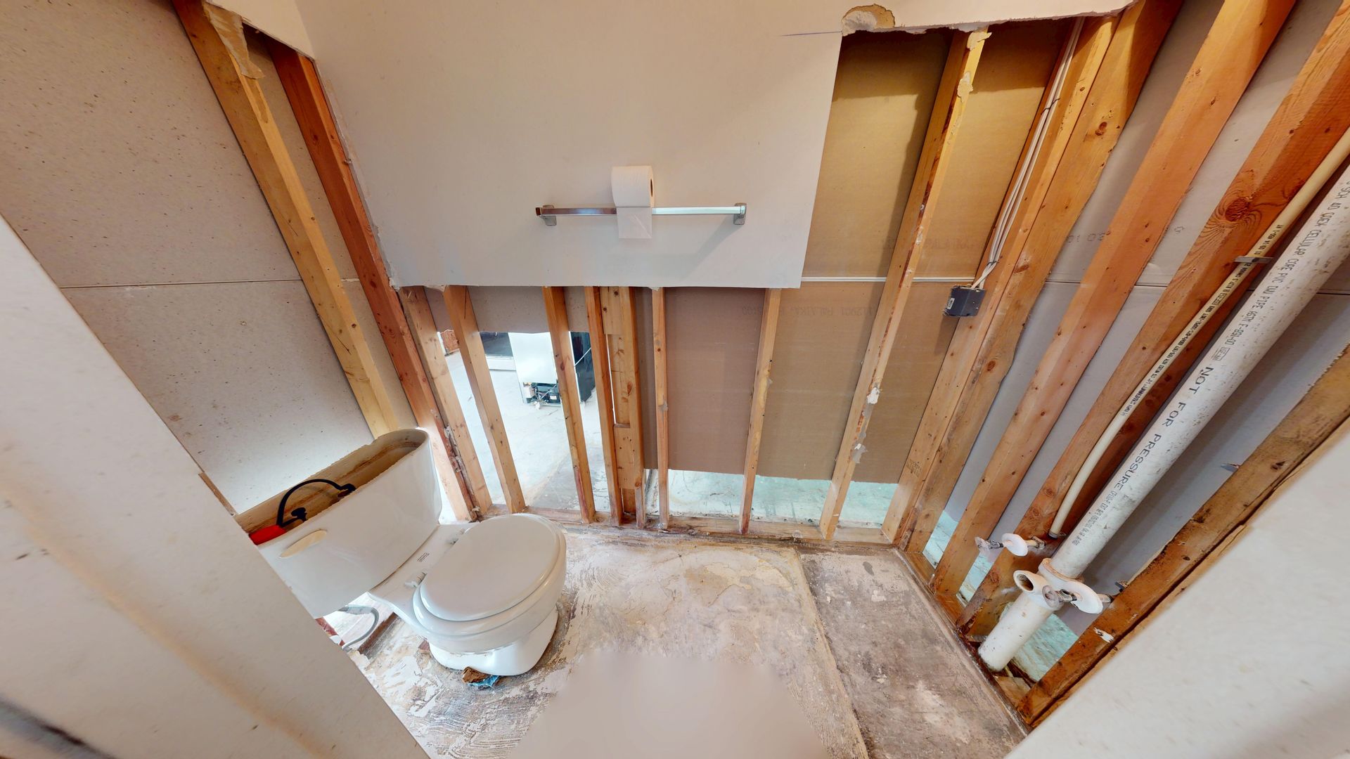 Bathroom water damage before restoration