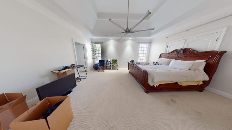 Master bedroom with carpet water damage