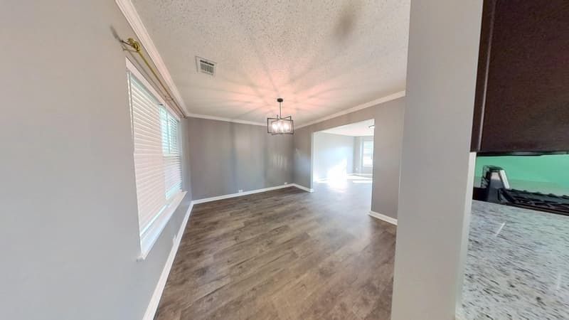 Interior space after fire restoration showing finished rebuild result