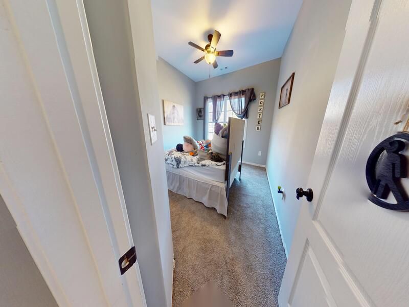 Flooded bedroom with damaged flooring