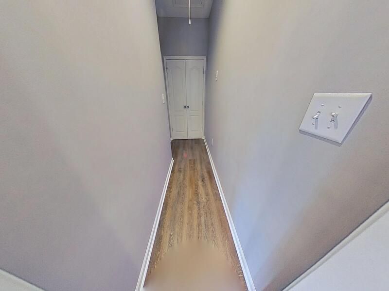 Restored hallway with new flooring