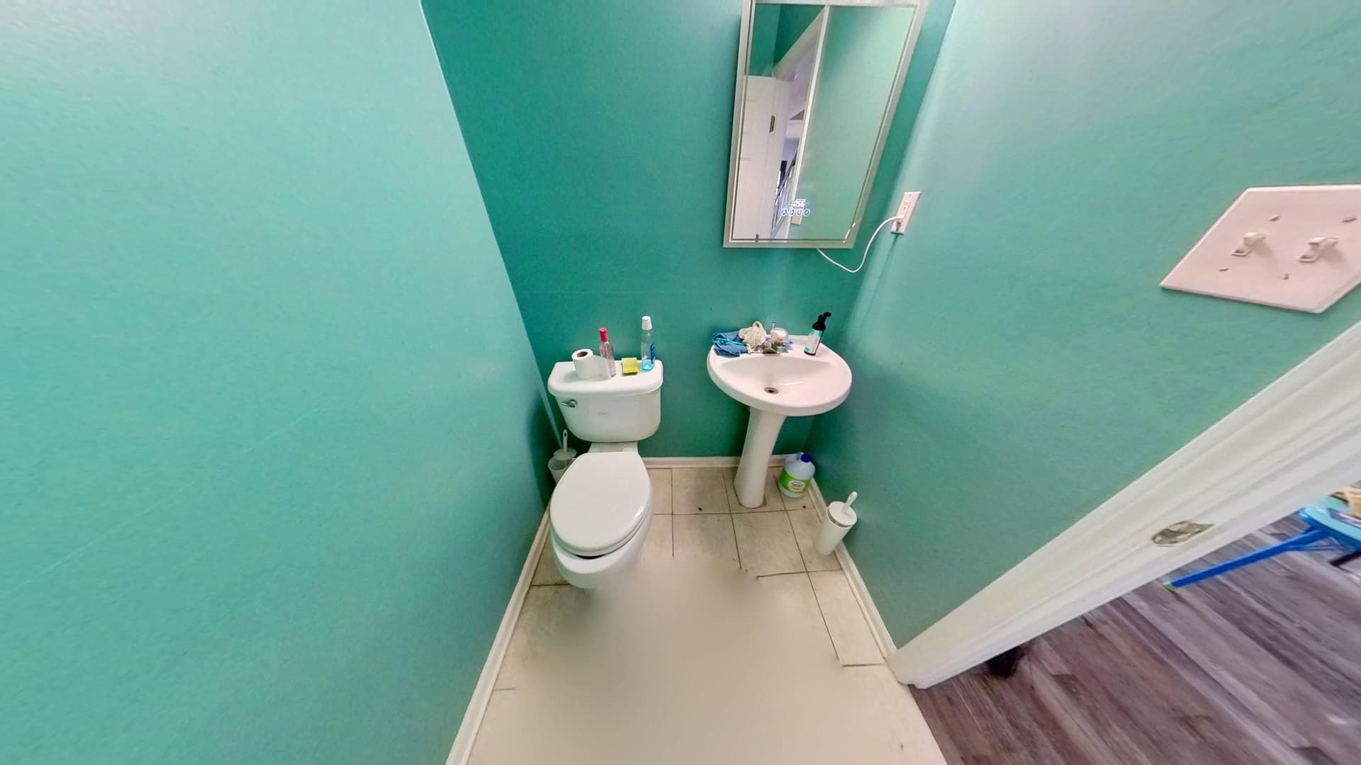 Fully restored guest bathroom with new flooring and trim in Lithonia home