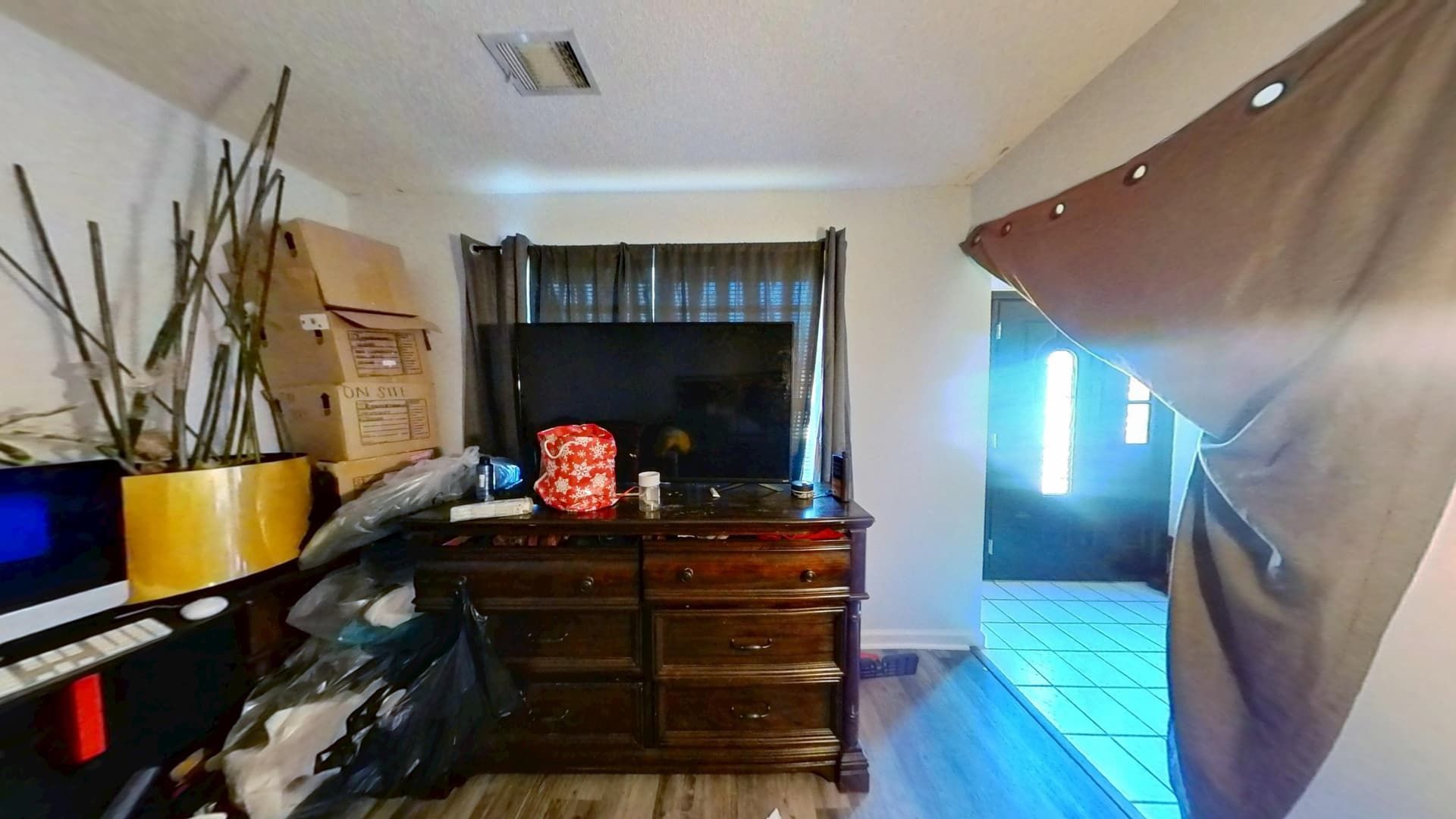 Restored office room with fresh paint, new flooring, and clean trim