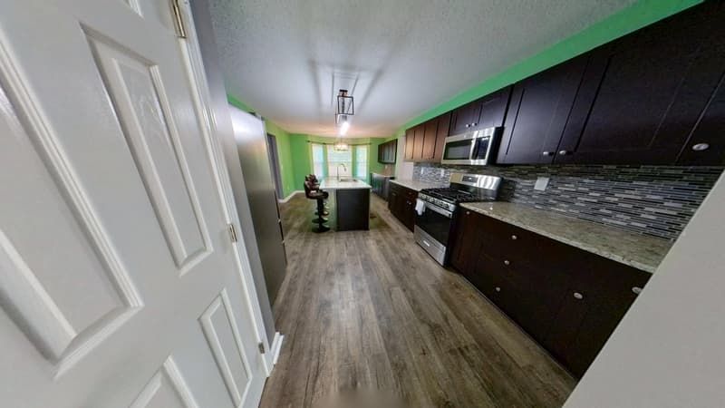Kitchen after fire damage restoration and full reconstruction