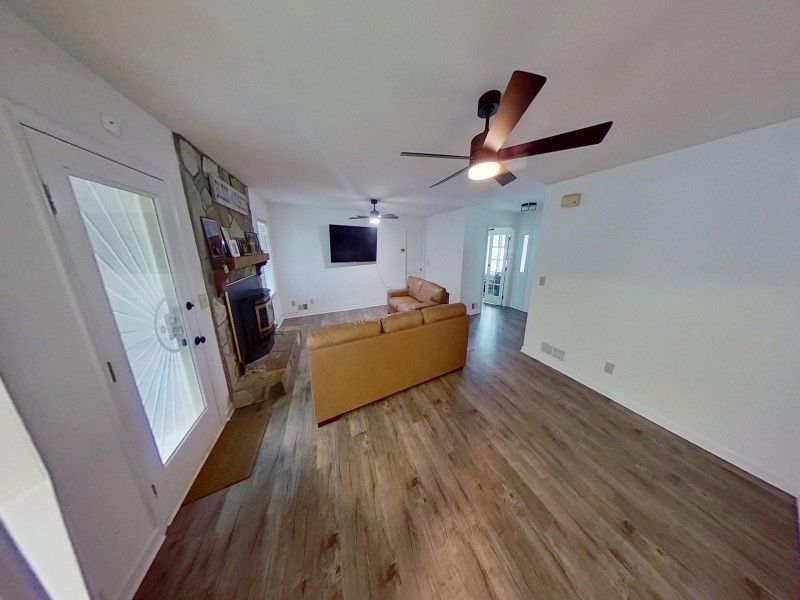 Living room fire damage after restoration different angle