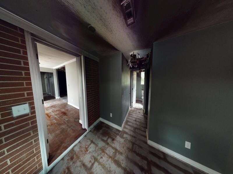 Living room fire damage before restoration