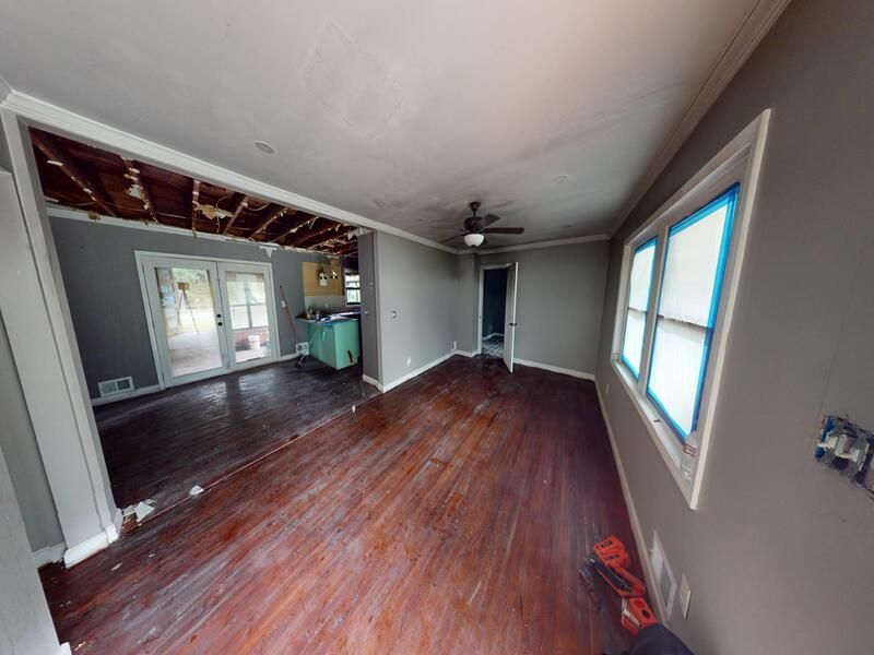 Living room kitchen fire damage before restoration