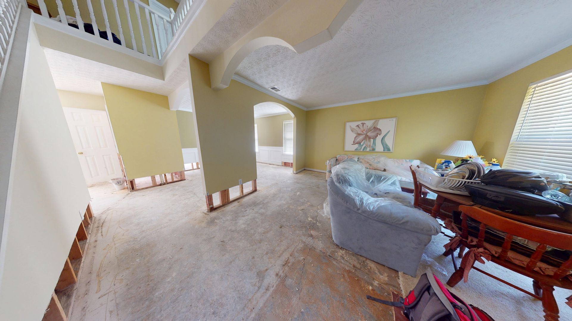 Living room water damage before restoration