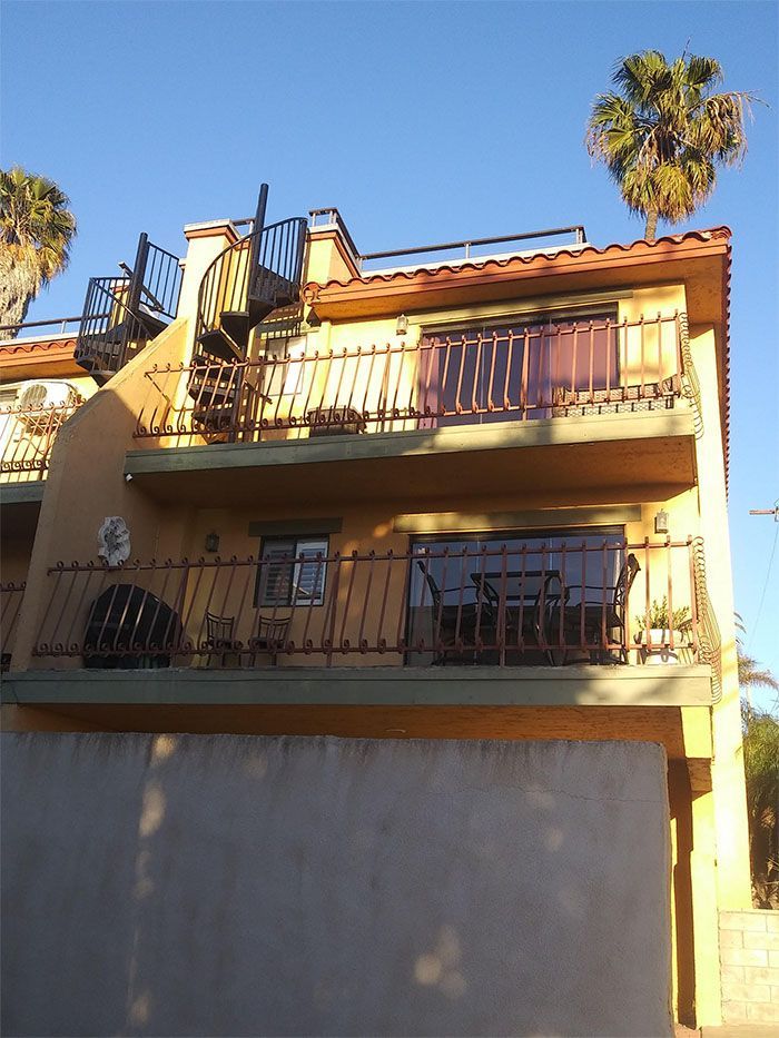 A house with a spiral staircase on the top of it