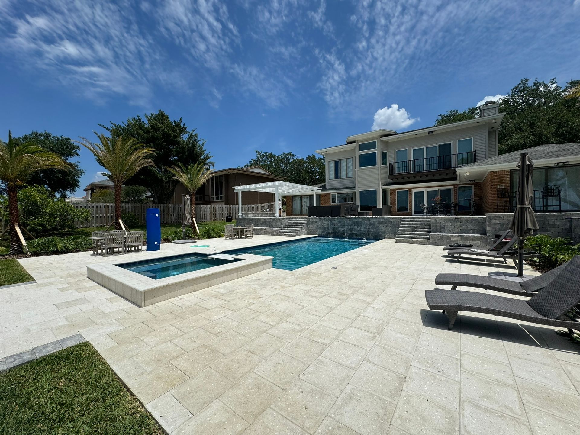 Pool Deck with 16x16 Artistic Pavers Shellock & Stonegate Glacier Walls.