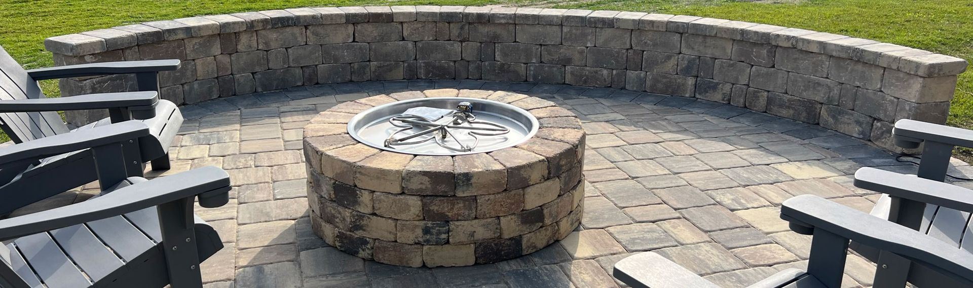 Stonegate Sierra Seating Wall & Firepit with Lions Bridge Pavers & HPC Firepit Insert