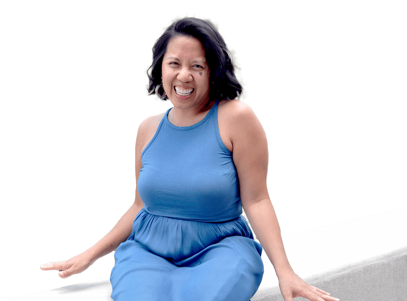 A charismatic photo of Lisa wearing a blue dress.