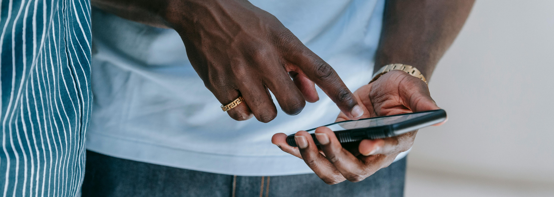 Picture of somebody swiping on a smartphone screen.