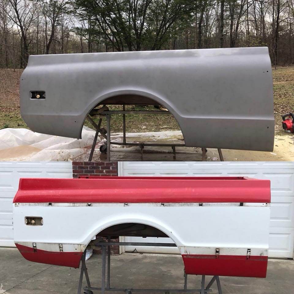 A red and white truck bed is sitting on a table