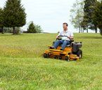 Lawn Mower — Man Riding Lawn Mower in Brandon, VT