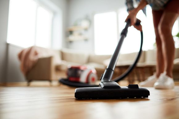 Woman Using Vacuum Cleaner — Baldwin, MD — JPI Services
