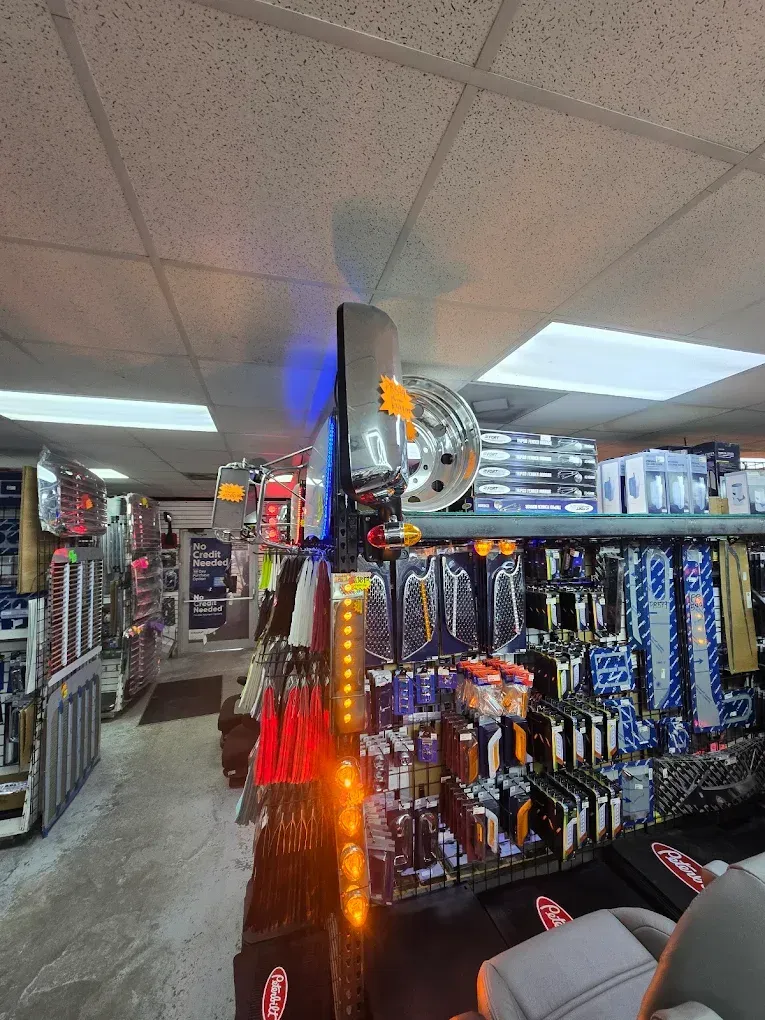 A car parts store with a lot of products on display