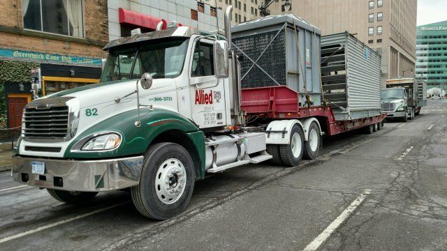 Tow Truck Service — Tow Truck on the Road in Detroit, MI