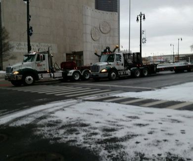 Commercial Truck Towing — Two Towing Truck on the Road in Detroit, MI