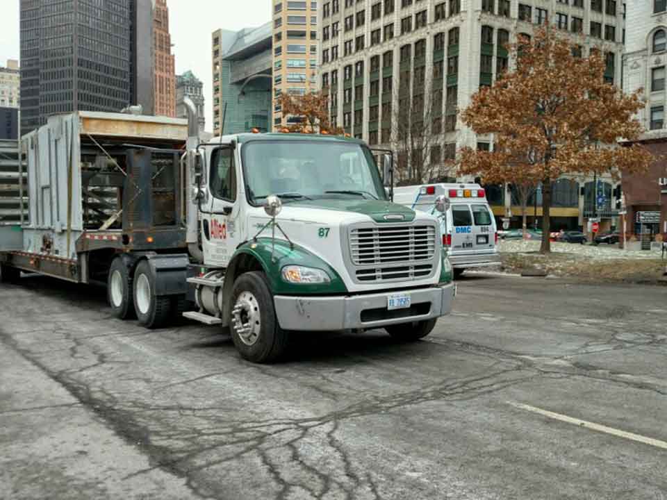 RV Towing — Towing Truck on the Road in Detroit, MI
