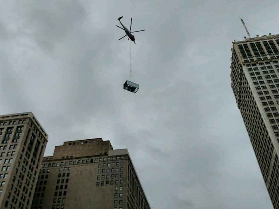 Cargo Towing — Helicopter Transporting a Load in Detroit, MI
