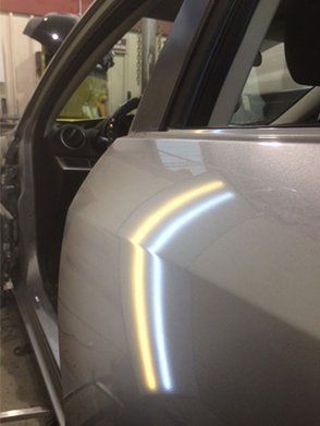 Automotive dent repair in Highland, IN.