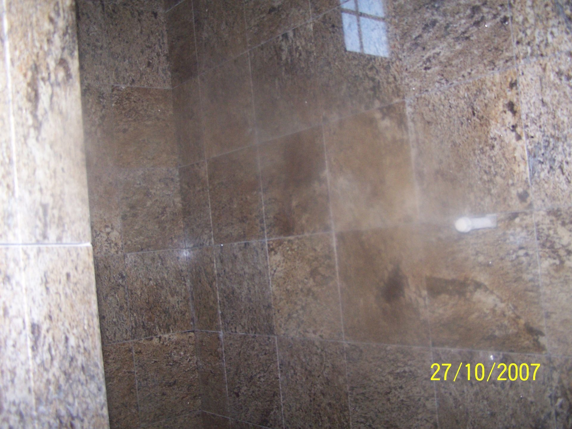 A picture of a tiled floor taken on 27/10/2007