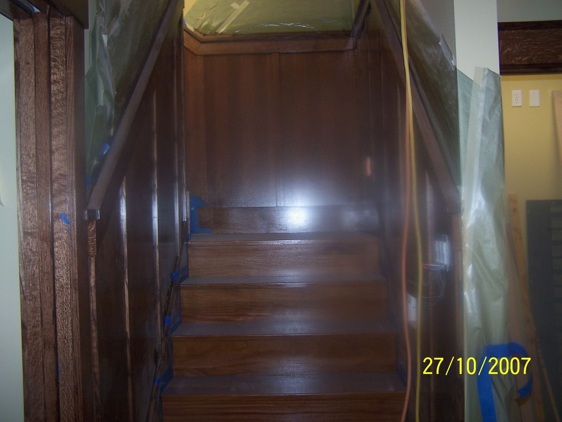 A photo of a wooden staircase taken on 27/10/2007
