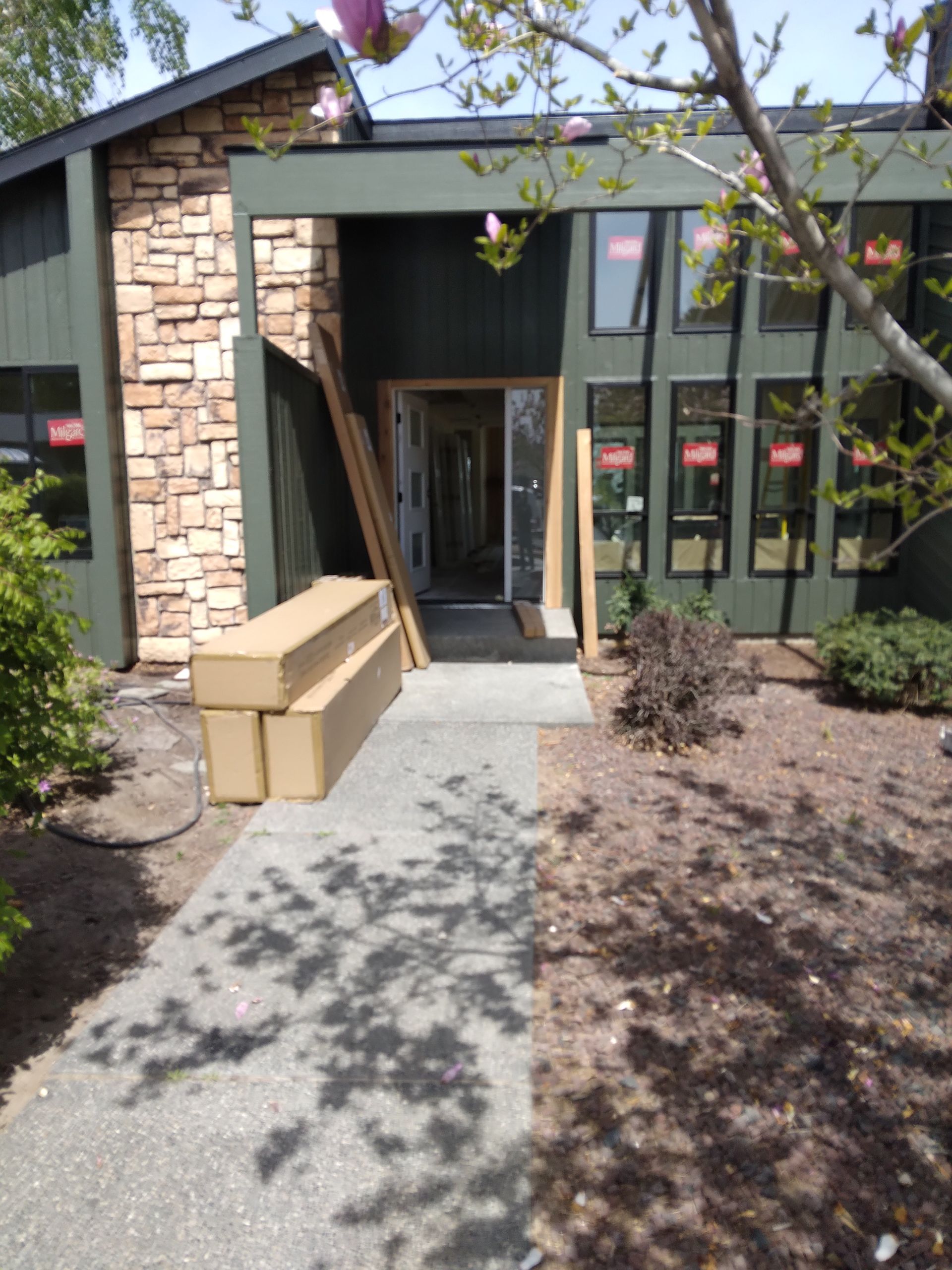 A building with a concrete walkway leading to it