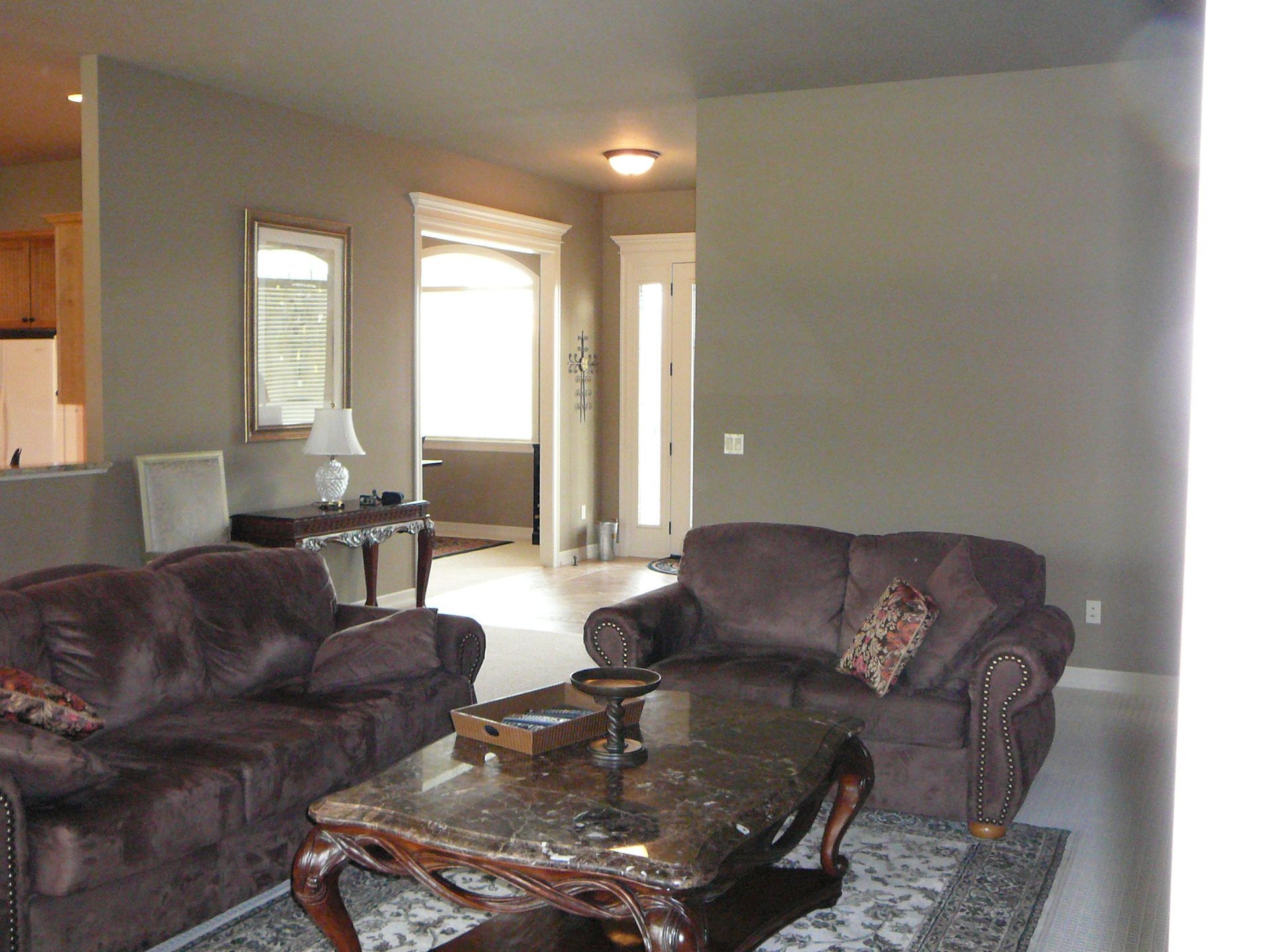 A living room with two couches and a coffee table