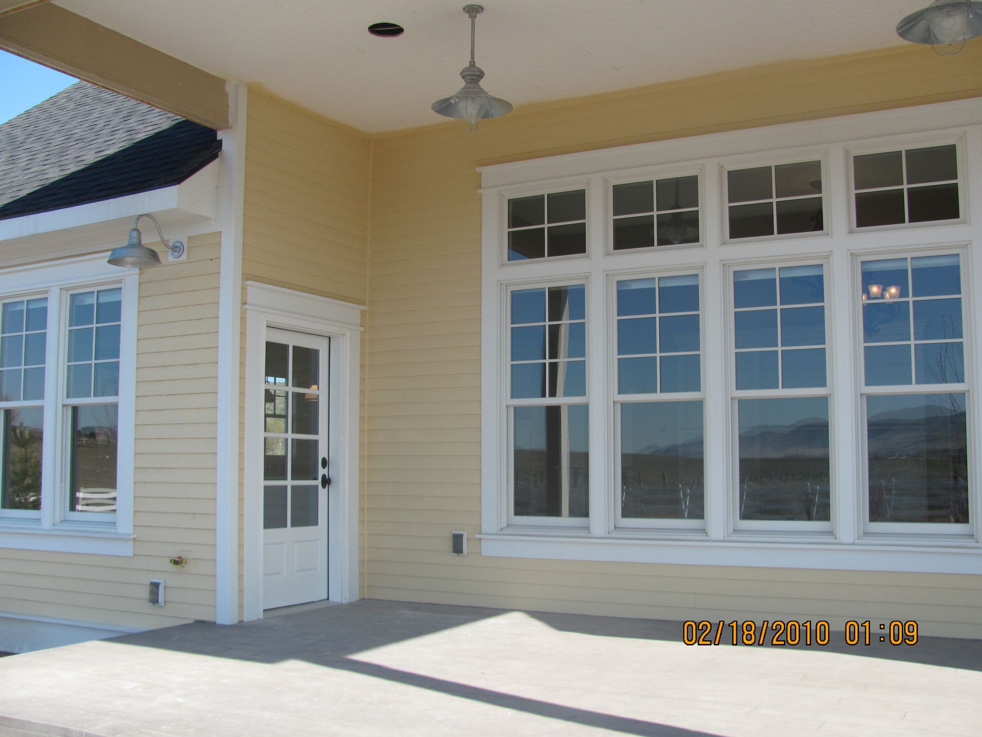 A building with a lot of windows and the date 02/08/2010