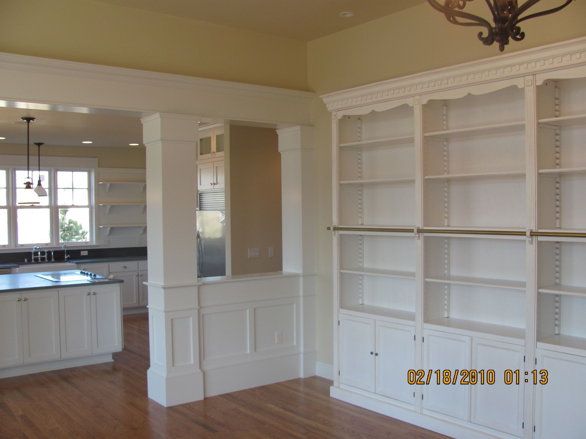A picture of a kitchen and library was taken on february 18 2010