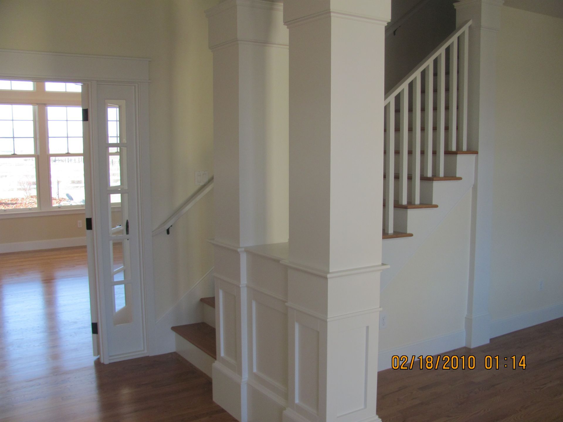 A picture of a staircase in a house taken on june 18 2010