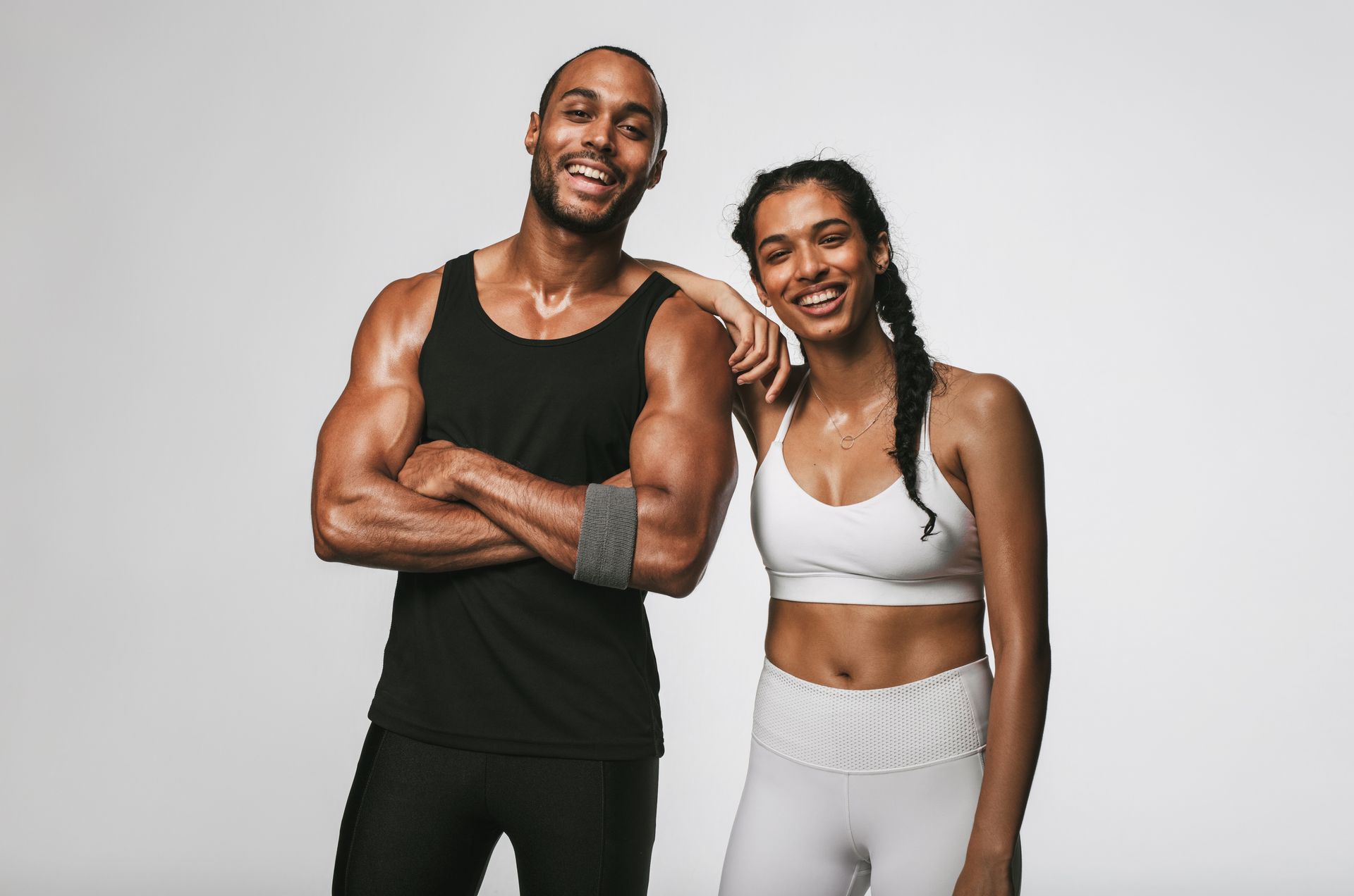 A man and a woman are posing for a picture together.