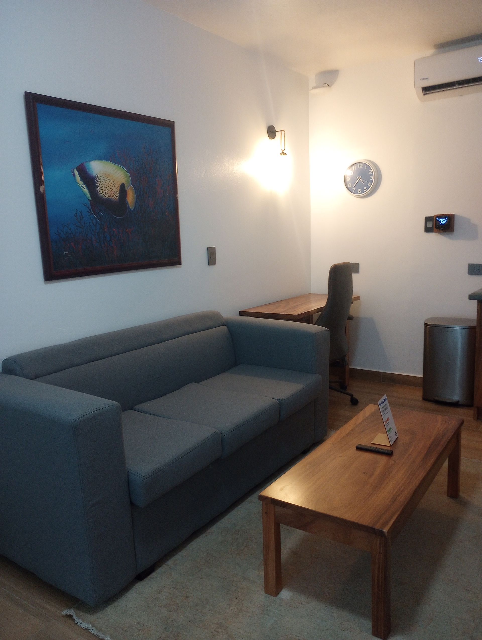 A living room with a couch and a coffee table