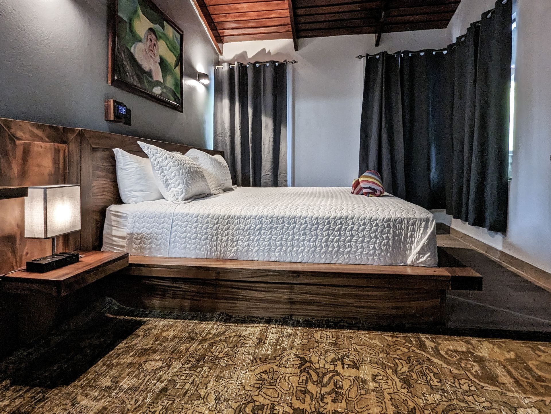 There is a large bed in the middle of the room.