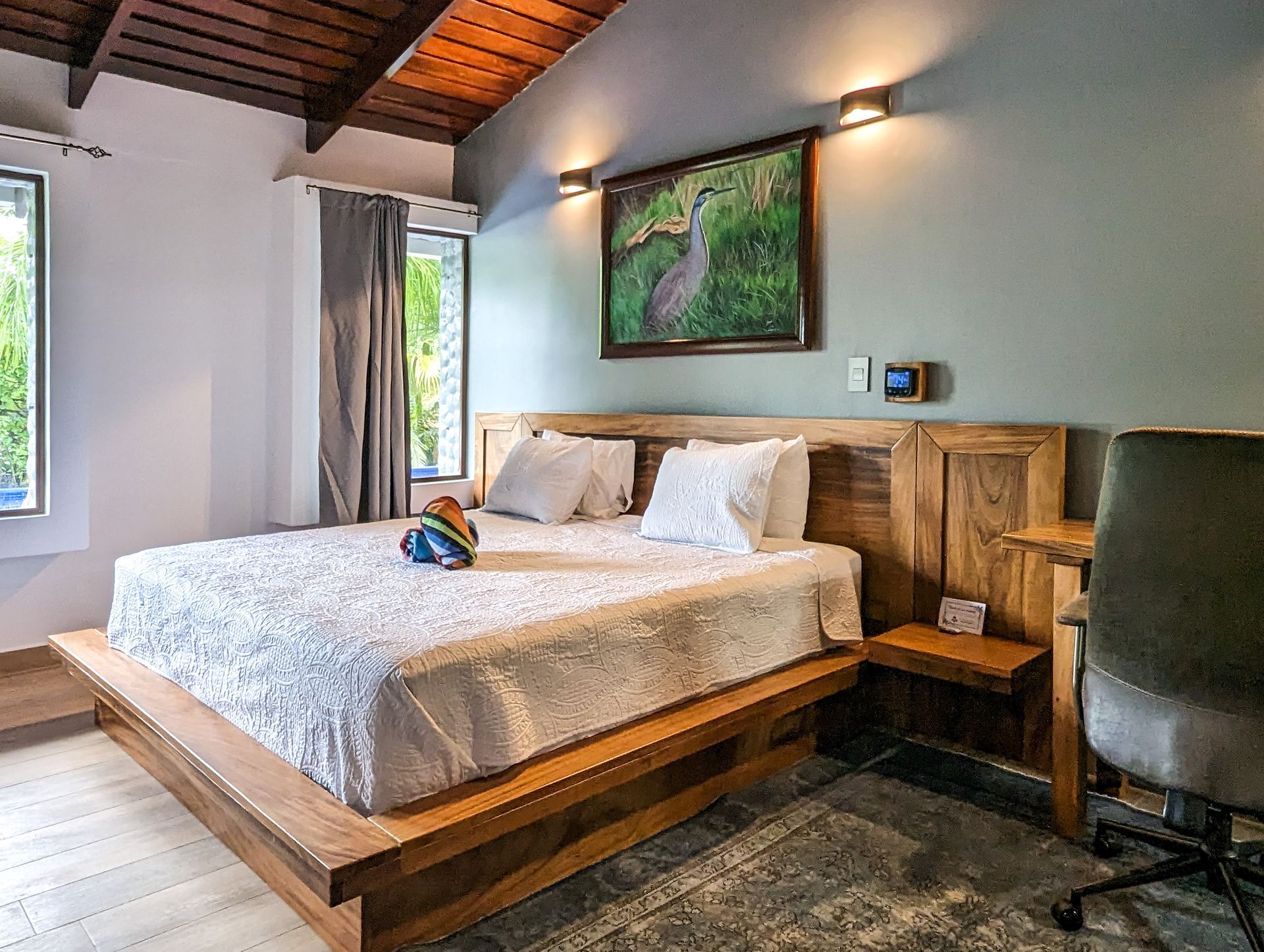 There is a large bed in the middle of the room.