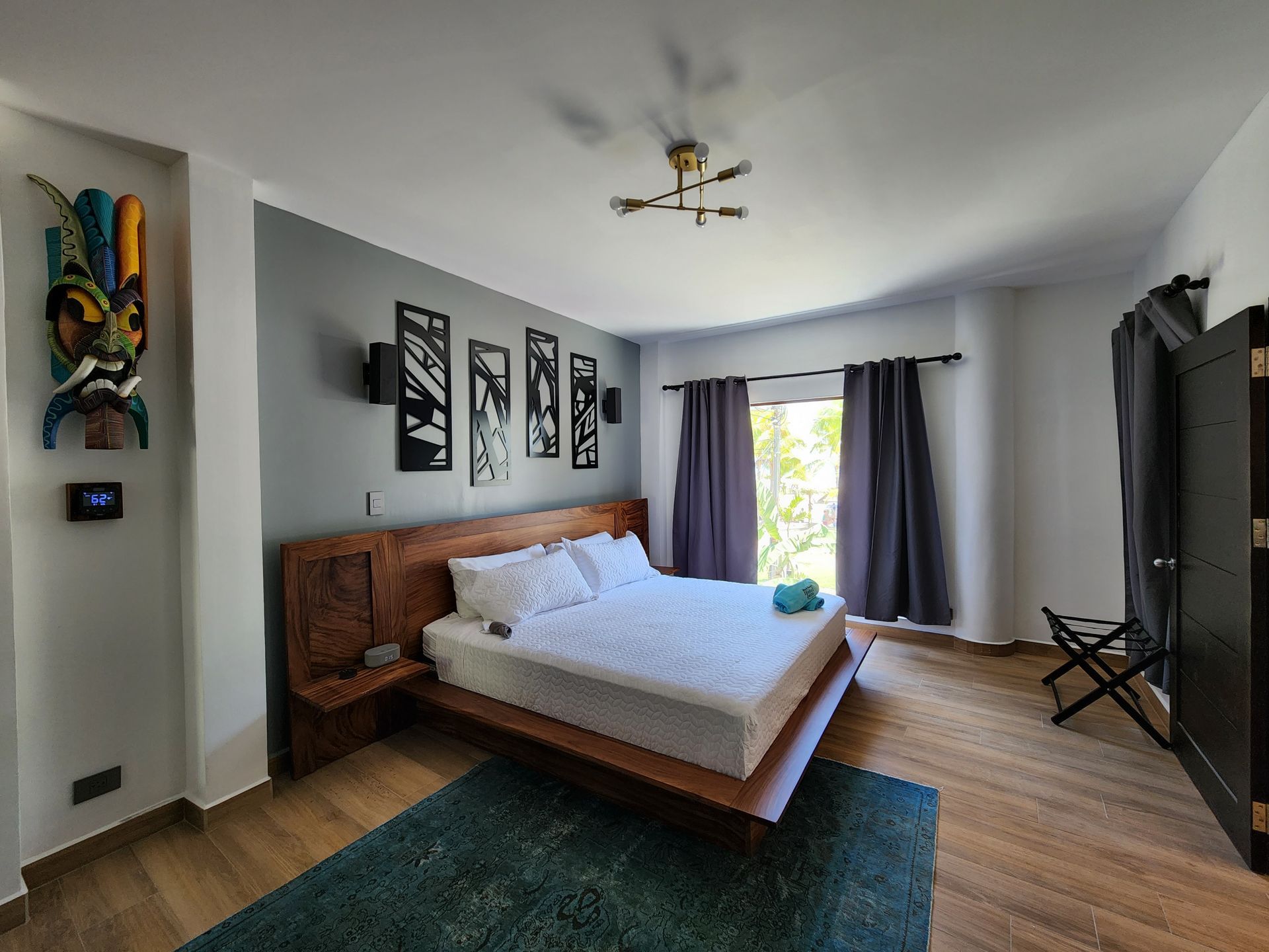 There is a large bed in the middle of the room.