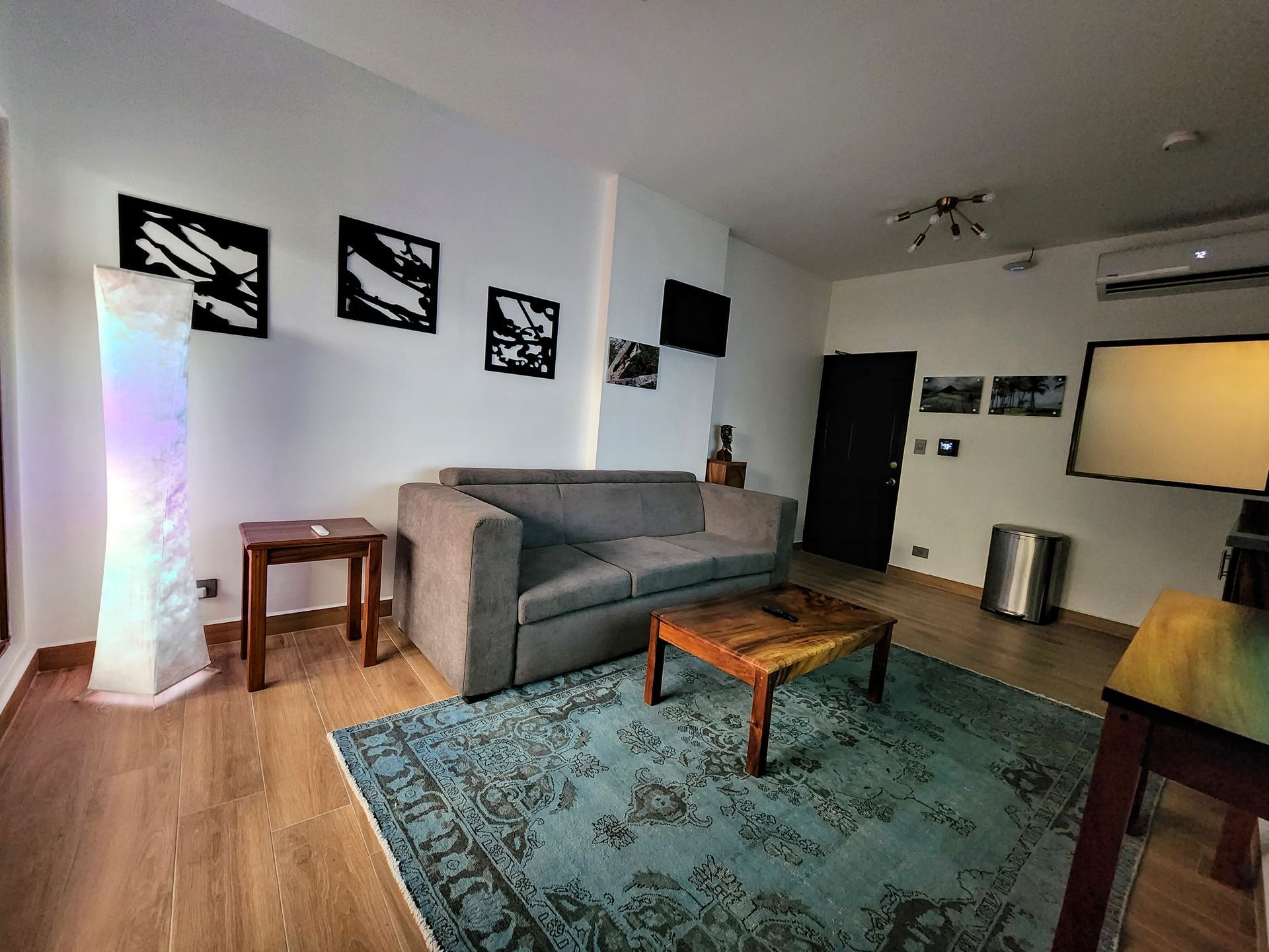 A living room with a couch and a coffee table