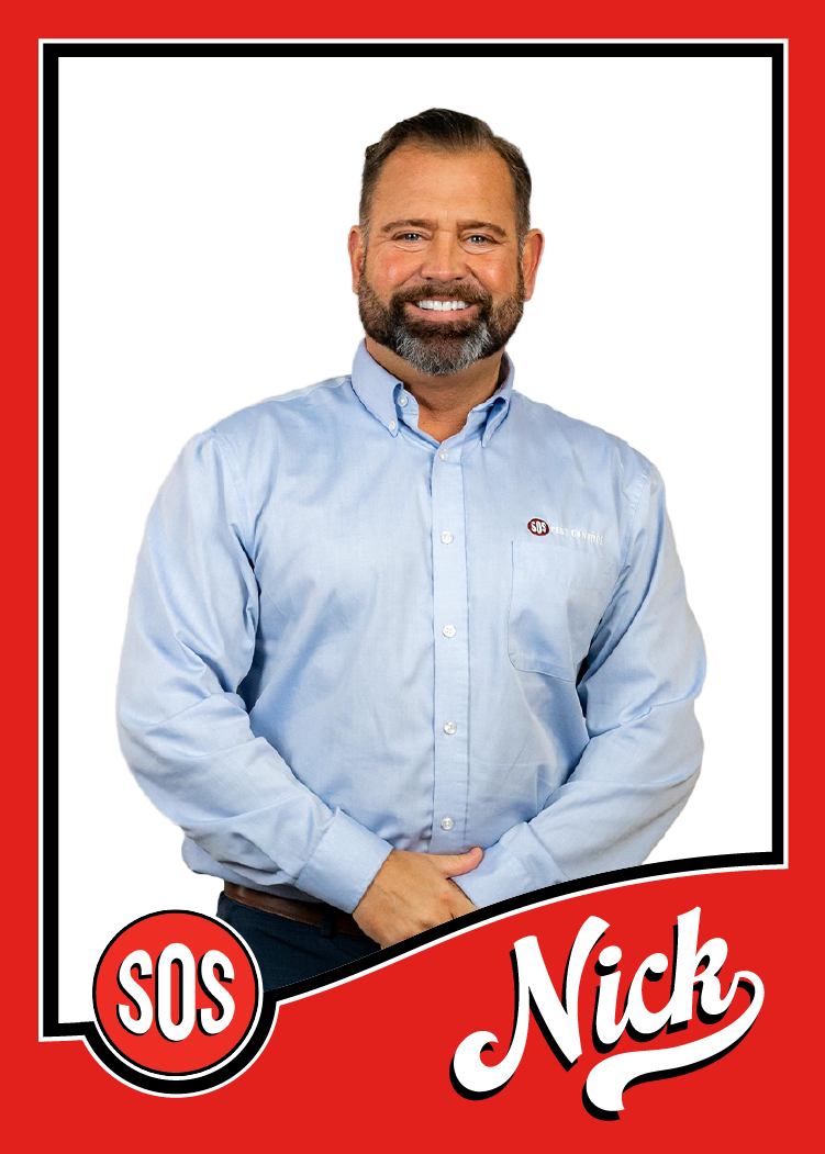 Nick is the Senior Sales Representative. He is standing with his hands folded in front of him.